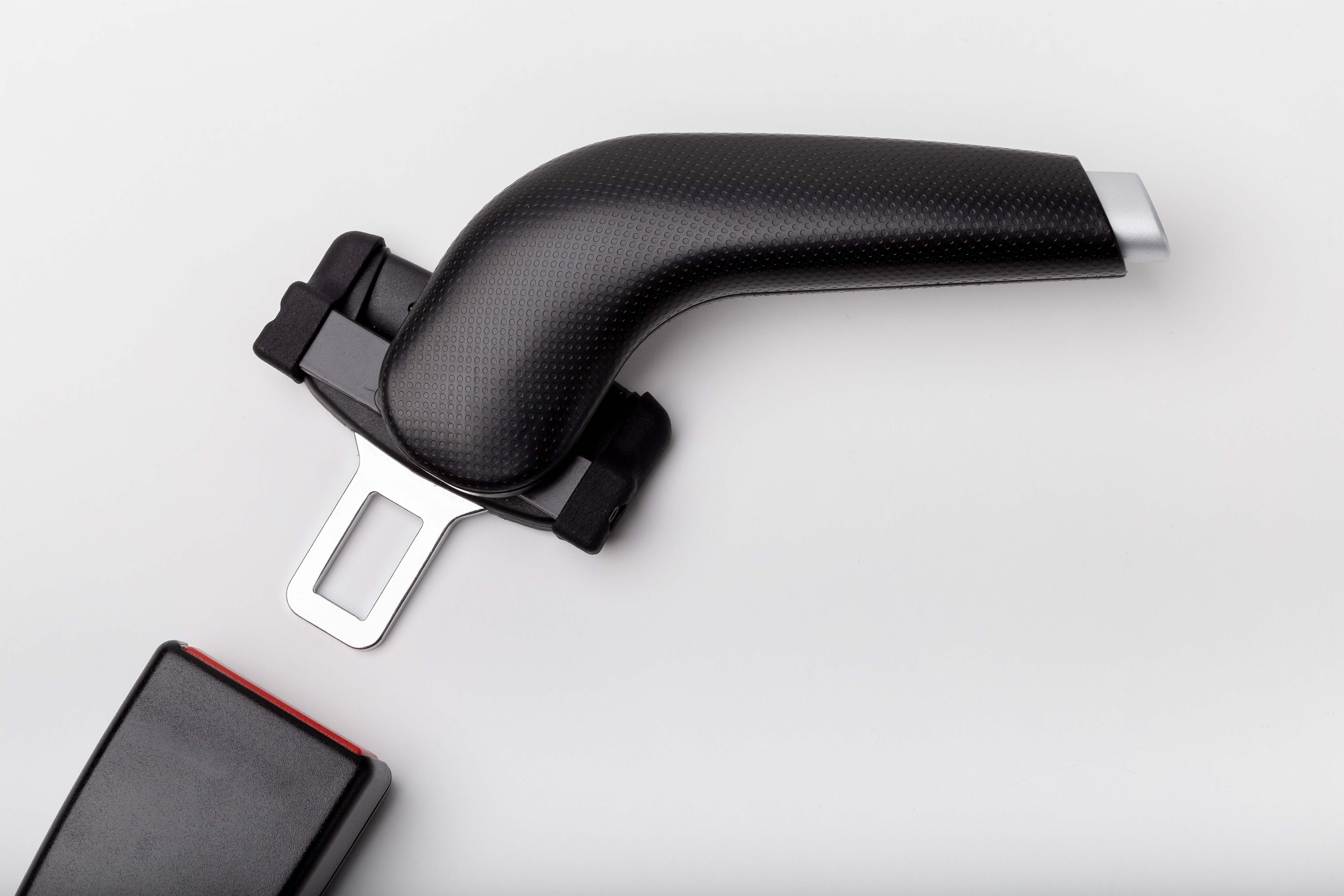 The JIMMY by Veigel is a seat buckle assist device designed to aid drivers with buckling and unbuckling the seat belt buckle in an automobile.